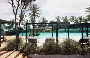 Job offers six-figure salary and room in luxury resort with cinema & Olympic pool but you need to get dirty